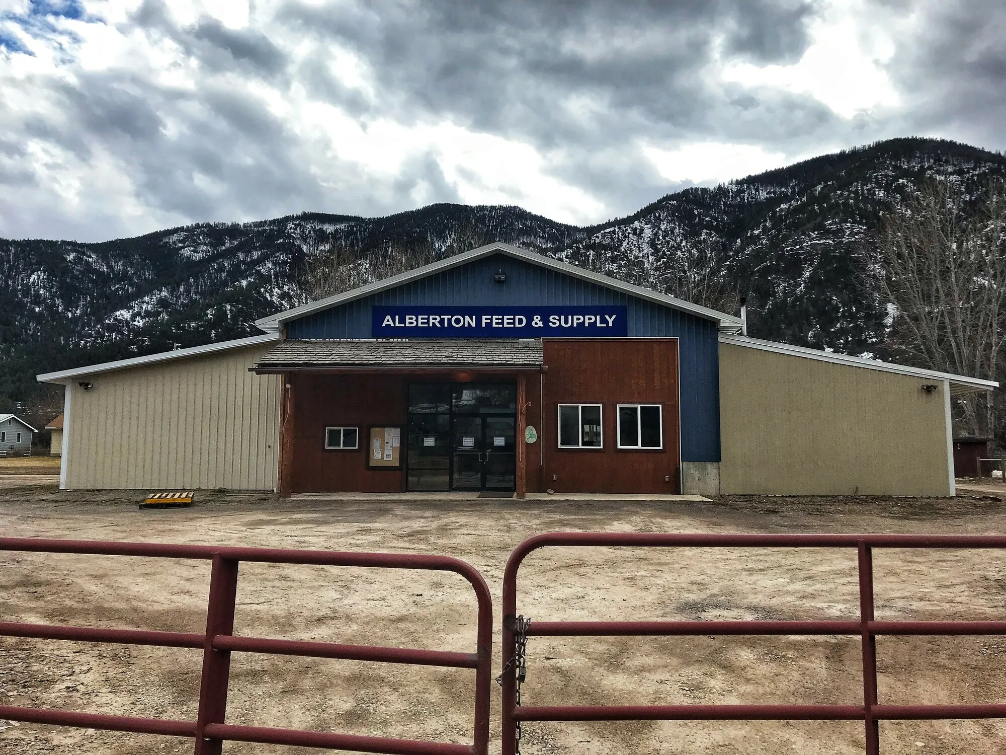 Alberton Feed & Supply building with mountains behind it